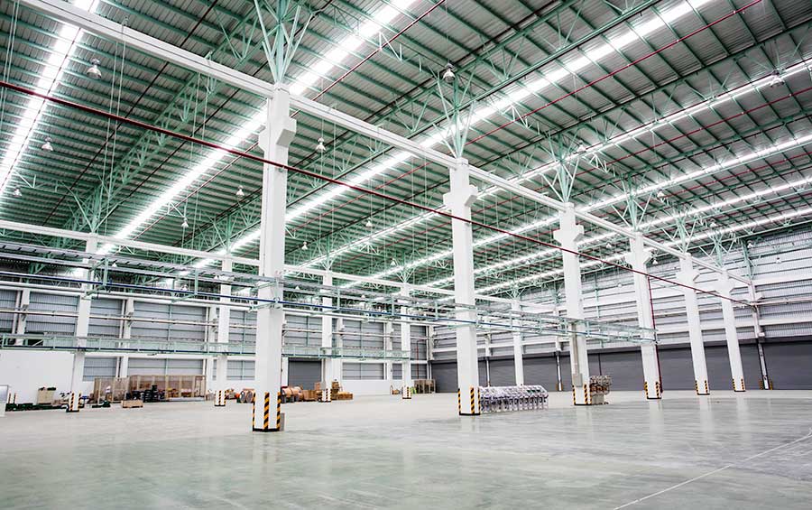 image of commercial warehouse with lighting and metal roofing and columns