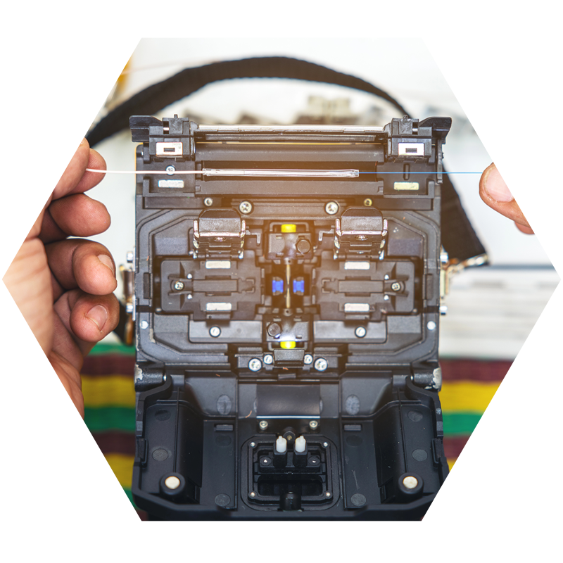 person configuring fiber optics cables