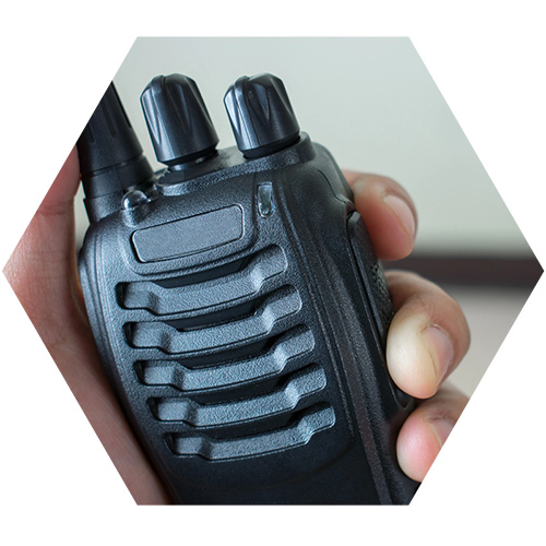 Two Way Radio being held up in hand