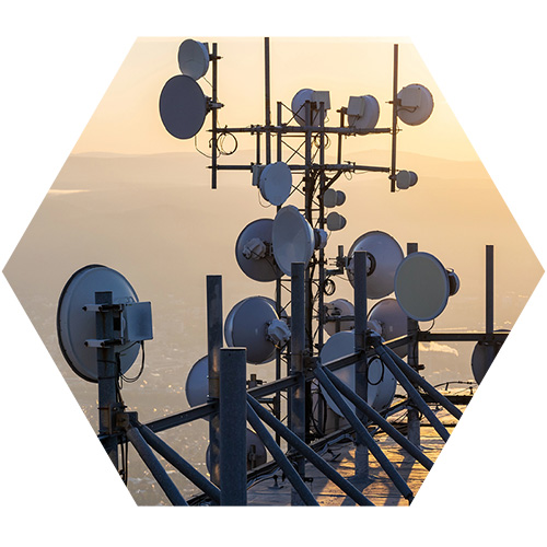 Wireless antennas on top of a building overlooking land